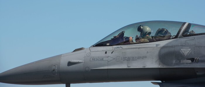 An F-16 Fighting Falcon from Shaw Air Force Base, S.C., flew in to help the 628th Civil Engineering Squadron test the aircraft arresting system on the flight line at Joint Base Charleston – AB, S.C., on Oct. 14, 2015.  The F-16 Fighting Falcon had to travel at least 70 knots to trip the AAS successfully. (U.S. Air Force photo/Airman 1st Class Thomas T. Charlton)