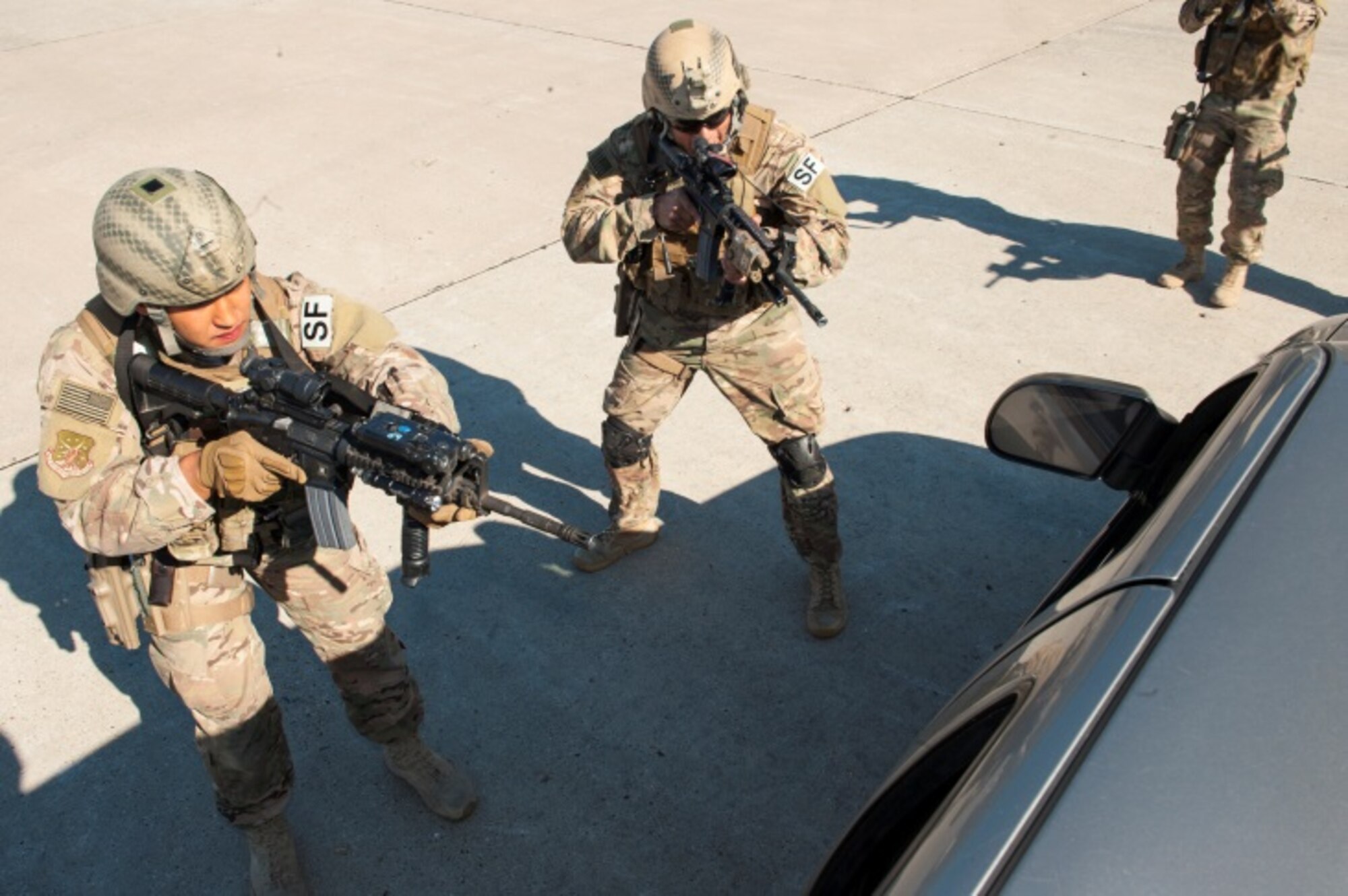 Members of the 791st Missile Security Forces Squadron tactical response force approach a suspect’s vehicle during a training exercise at Minot Air Force Base, N.D., Oct. 8, 2015. TRF perform exercises regularly to help maintain readiness. (U.S. Air Force photo/Airman 1st Class Christian Sullivan)
