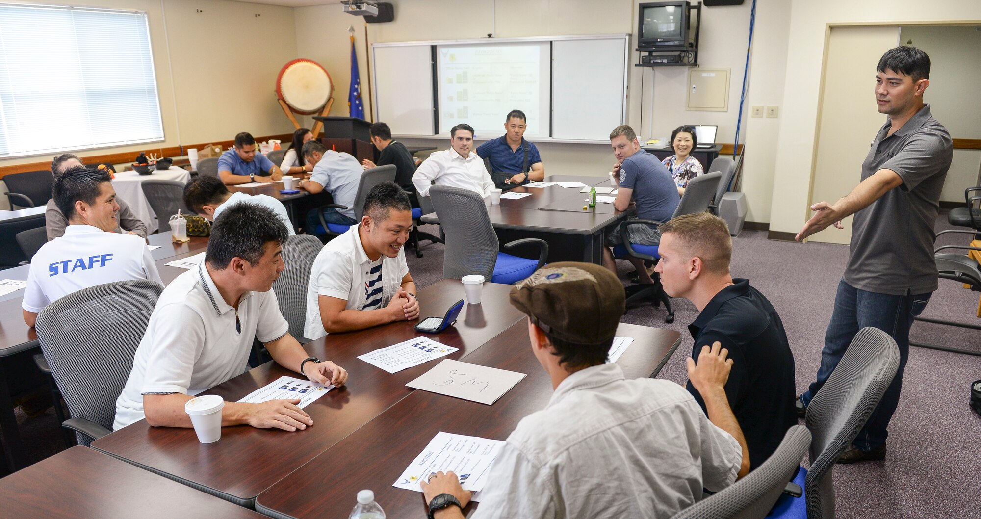 U.S. Air Force members from Kadena Air Base and Japanese Air Self Defense Force members from the 83rd Air Wing and Southwest Air Component Division gather for the first Bilateral Leadership Officers Group meeting Oct. 24, 2015, on Kadena Air Base, Japan. The officers engaged in various communication and team-based activities to improve their understanding of one another’s culture and broaden their understanding of how to be a better leader. (U.S. Air Force photo by Senior Airman John Linzmeier)