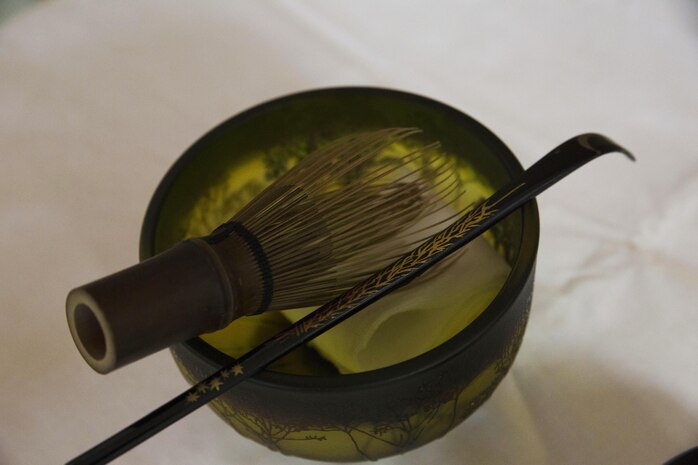 A chasen, a bamboo whisk, and a chashaku, a tea scooper, were some of the instruments used during a tea ceremony with the Omotesenke Tea Ceremony Club hosted by the Cultural Adaptation Program at Marine Corps Air Station Iwakuni, Japan, Oct. 17, 2015. Station residents used this opportunity to connect with the Japanese through their culture.