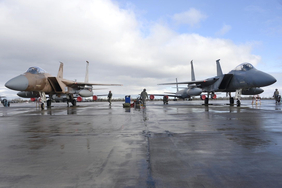 U.S. aircraft crews prepare Air Force F-15C Eagles for their first launch during Exercise Vigilant Shield 16 from 5 Wing Goose Bay, a Canadian air force base, in Newfoundland, Oct. 19, 2015. The crews are assigned to the California National Guard’s 144th Fighter Wing. About 700 members from Canadian forces and the U.S.Air Force, Navy and Air National Guard deployed to Iqaluit, Nunavut, and 5 Wing Goose Bay, Newfoundland, for Exercise Vigilant 16. U.S. Air National Guard photo by Staff Sgt. Christian Jadot