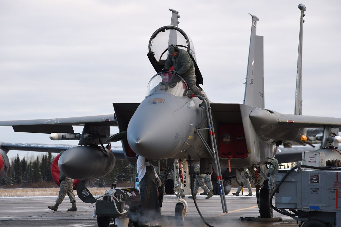 U.S. airmen prepare a U.S. Air Force F-15C Eagle for the first mission during Exercise Vigilant Shield 16 from 5 Wing Goose Bay, Newfoundland, Oct. 19, 2015. The airmen are assigned to the California National Guard’s 144th Fighter Wing. U.S. Air National Guard photo by Senior Master Sgt. Chris Drudge