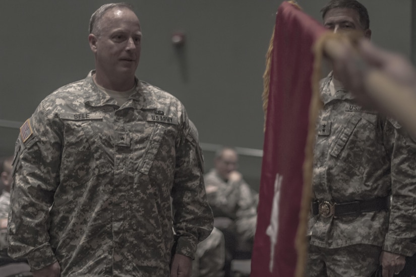 The one-star flag is unfurled for Brig. Gen. Richard Sele at his promotion ceremony hosted by Maj. Gen. Daniel Ammerman, U.S. Army Civil Affairs and Psychological Operations Command (Airborne) commanding general, at the Airborne and Special Operations Museum in Fayetteville, N.C., Oct. 25, 2015. Sele, a longtime Soldier with USACAPOC, takes over for Brig. Gen. A. Ray Royalty as the 108th Training Command (IET), deputy commanding general. (U.S. Army photo by Sgt. 1st Class Brian Hamilton)