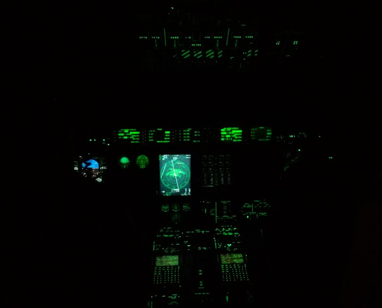 Capt. Chase Allen and Capt. Jordan Mentzer pilot through Hurricane Patricia in pitch black conditions October. 23 2015. (U.S. Air Force Photo/Master Sgt. Brian Lamar)
