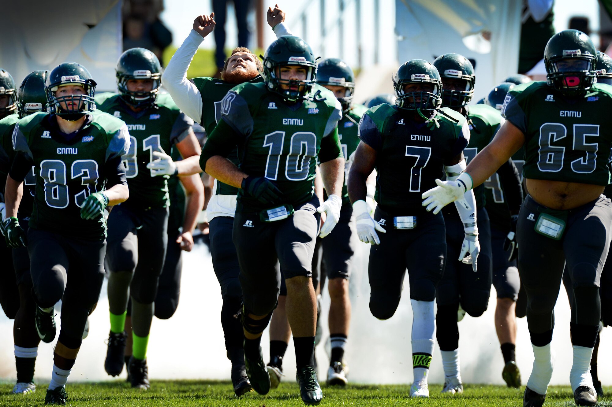 The Eastern New Mexico University Greyhounds take to the feild during a military appreciation game at Blackwater Draw Stadium Oct. 24, 2015, in Clovis, N.M. After four quarters of play, the Greyhounds emerged victorious over the Angelo State University Rams 46-28 for their final game at Blackwater Draw. (U.S. Air Force photo/Staff Sgt. Matthew Plew)