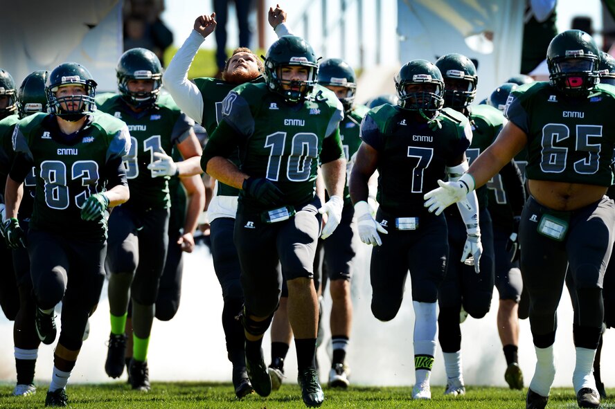 The Eastern New Mexico University Greyhounds take to the feild during a military appreciation game at Blackwater Draw Stadium Oct. 24, 2015, in Clovis, N.M. After four quarters of play, the Greyhounds emerged victorious over the Angelo State University Rams 46-28 for their final game at Blackwater Draw. (U.S. Air Force photo/Staff Sgt. Matthew Plew)