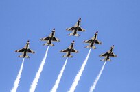 The U.S. Air Force Aerial Demonstration Squadron “Thunderbirds” practice performing F-16 acrobatic maneuvers Oct. 26, 2015 at Joint Base San Antonio-Randolph, Texas. The Thunderbirds team members arrived in preparation for the 2015 JBSA-Randolph Air Show and Open House to be held Oct. 31 and Nov. 1.  Air shows allow the Air Force to display the capabilities of our aircraft to the American taxpayer through aerial demonstrations and static displays and allowing attendees to get up close and personal to see some of the equipment and aircraft used by the U.S. military today.  (U.S. Air Force photo by Johnny Saldivar/Released)