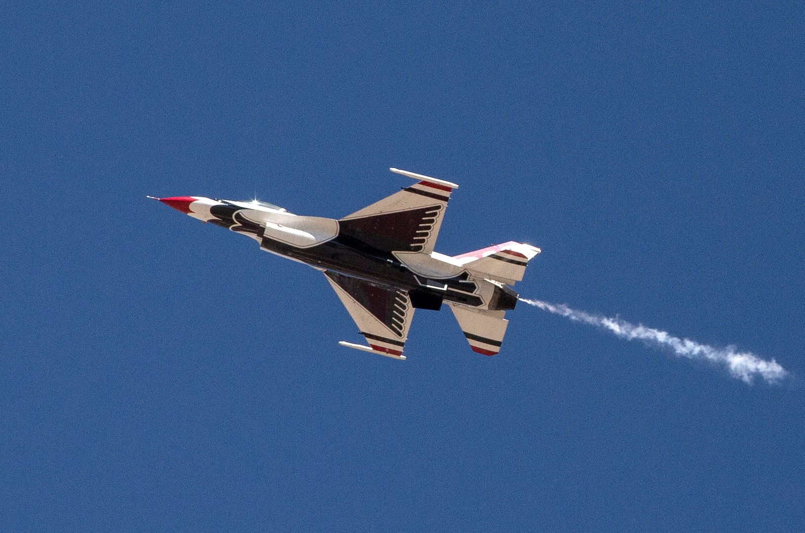 The U.S. Air Force Aerial Demonstration Squadron “Thunderbirds” practice performing F-16 acrobatic maneuvers Oct. 26, 2015 at Joint Base San Antonio-Randolph, Texas. The Thunderbirds team members arrived in preparation for the 2015 JBSA-Randolph Air Show and Open House to be held Oct. 31 and Nov. 1.  Air shows allow the Air Force to display the capabilities of our aircraft to the American taxpayer through aerial demonstrations and static displays and allowing attendees to get up close and personal to see some of the equipment and aircraft used by the U.S. military today.  (U.S. Air Force photo by Johnny Saldivar/Released)