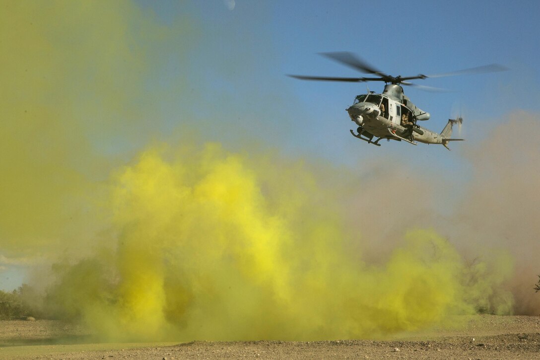 A Marine Corps UH-1Y Venom helicopter prepares to land during a casualty evacuation exercise at Fire Base Burt, Chocolate Mountain Aerial Gunnery Range, Calif., Oct. 22, 2015. The helicopter crew is assigned to Marine Aviation Weapons and Tactics Squadron 1. U.S. Marine Corps photo by Lance Cpl. Roderick L. Jacquote 