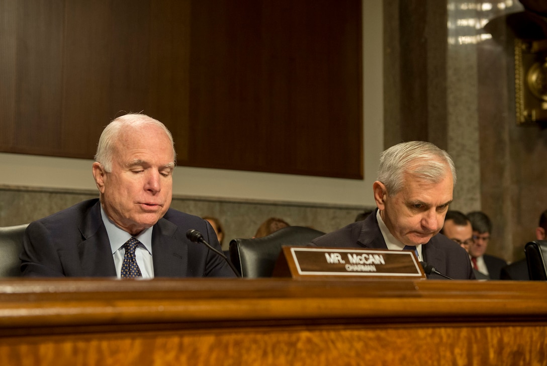 U.S. Sen. John McCain, left, chairman of the Senate Armed Services Committee, speaks as Defense Secretary Ash Carter and Marine Corps Gen. Joseph F. Dunford Jr., chairman of the Joint Chiefs of Staff, appear before the committee to testify on U.S. military strategy in the Middle East in Washington, D.C., Oct. 27, 2015. DoD photo by Air Force Senior Master Sgt. Adrian Cadiz