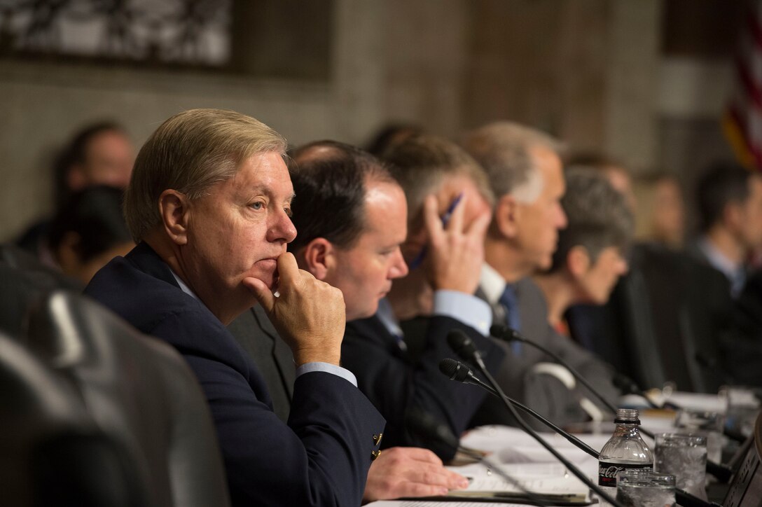 U.S. Sen. Lindsey Graham listens as Defense Secretary Ash Carter and Marine Corps Gen. Joseph F. Dunford Jr., chairman of the Joint Chiefs of Staff, testify on U.S. military strategy in the Middle East before the Senate Armed Services Committee in Washington, D.C., Oct. 27, 2015. DoD photo by Air Force Senior Master Sgt. Adrian Cadiz
