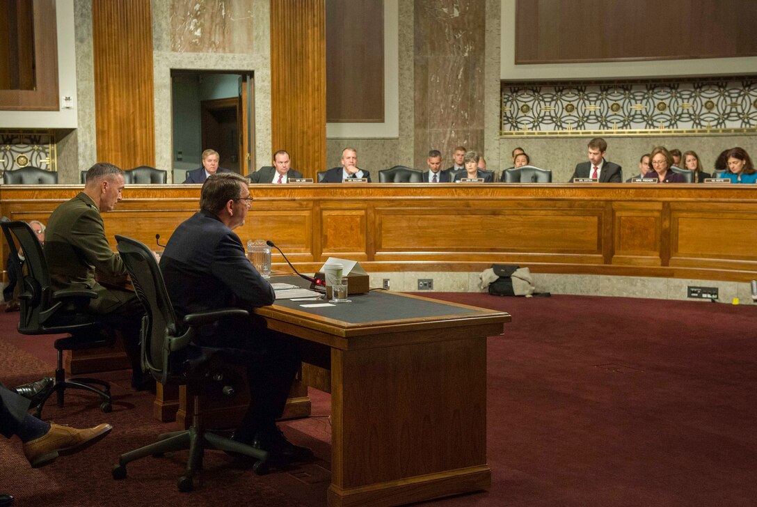 Defense Secretary Ash Carter and Marine Corps Gen. Joseph F. Dunford Jr., chairman of the Joint Chiefs of Staff, testify on U.S. military strategy in the Middle East before the Senate Armed Services Committee in Washington, D.C., Oct. 27, 2015. DoD photo by Air Force Senior Master Sgt. Adrian Cadiz