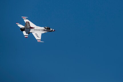A member of the U.S. Air Force Aerial Demonstration Squadron “Thunderbirds” flies over Joint Base San Antonio-Randolph Oct. 26, 2015. The Thuderbirds perform aerial demonstrations to highlight the unique capabilities of American military services, while showcasing the world’s most technologically advanced air and space force capabilities.