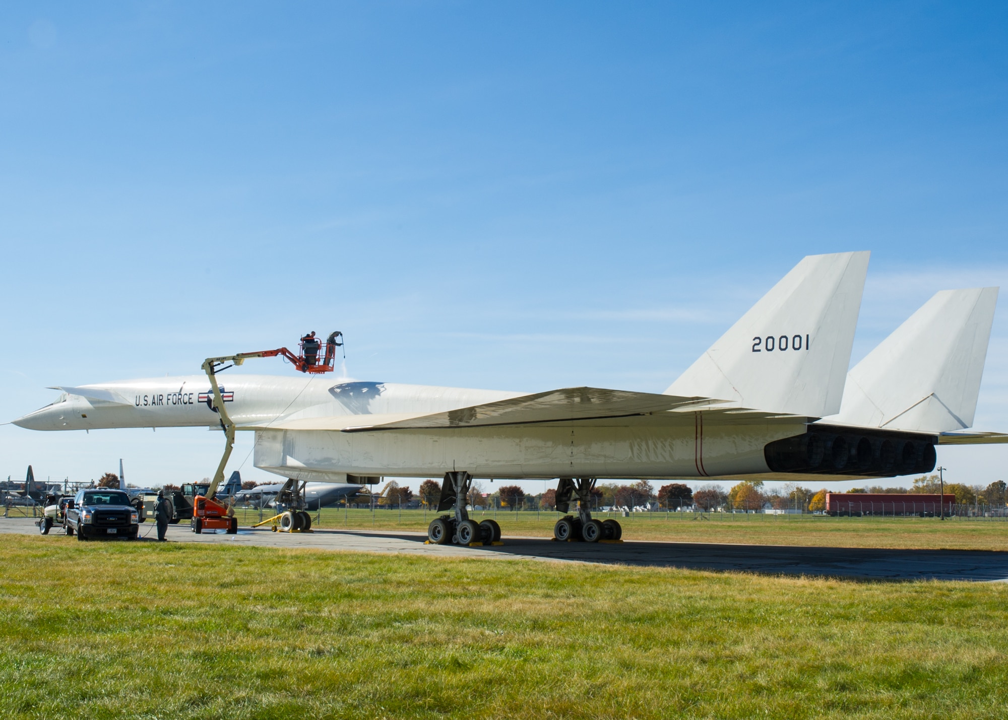 Restoration crews wash the North American XB-70 Valkyrie prior to its move to the new fourth building at the National Museum of the U.S. Air Force on Oct. 26, 2015. (U.S. Air Force photo by Ken LaRock)