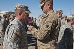 First Sgt. Brent Pearce, of Edmond, Okla., and a member of Company E, 700th Brigade Support Battalion, 45th Infantry Brigade Combat Team, is awarded the Army Commendation medal for his actions following a deadly accident at the Oklahoma State University homecoming parade in Stillwater, Oklahoma, on Oct. 24, 2015. Pearce was one of 45 Soldiers given medals for taking immediate action after a woman crashed through the crowd watching the parade, killing four and injuring more than 40 others. The Soldiers marched in the parade and were preparing to return to their armory when the accident occurred. 
