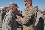 First Sgt. Brent Pearce, of Edmond, Okla., and a member of Company E, 700th Brigade Support Battalion, 45th Infantry Brigade Combat Team, is awarded the Army Commendation medal for his actions following a deadly accident at the Oklahoma State University homecoming parade in Stillwater, Oklahoma, on Oct. 24, 2015. Pearce was one of 45 Soldiers given medals for taking immediate action after a woman crashed through the crowd watching the parade, killing four and injuring more than 40 others. The Soldiers marched in the parade and were preparing to return to their armory when the accident occurred. 