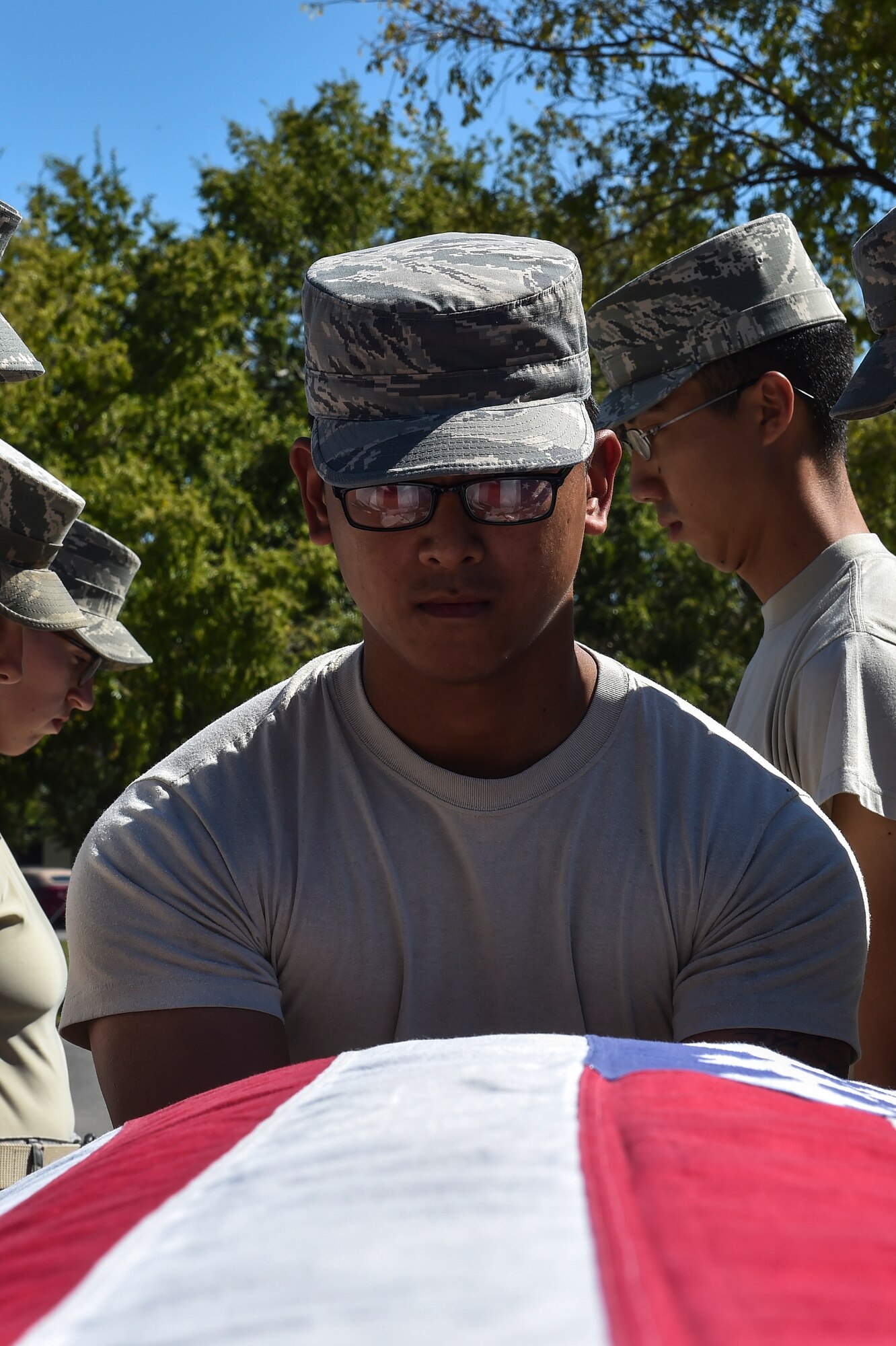 Senior Airman Vergel Matheny, Tyndall Air Force Base Honor Guard member, holds a training casket during training at Hurlburt Field, Fla., Oct. 15, 2015. A total of 15 base honor guard members from Hurlburt Field, Eglin AFB and Tyndall AFB, Fla., participated in a seven-day course on proper flag presentation, firing party and pallbearer techniques. The U.S. Air Force Honor Guard mobile training team traveled from Bolling Air Force Base, Washington, D.C., and provided 80 hours of instruction to standardize basic protocol, honors and ceremony procedures Air Force-wide. (U.S. Air Force photo by Senior Airman Jeff Parkinson)