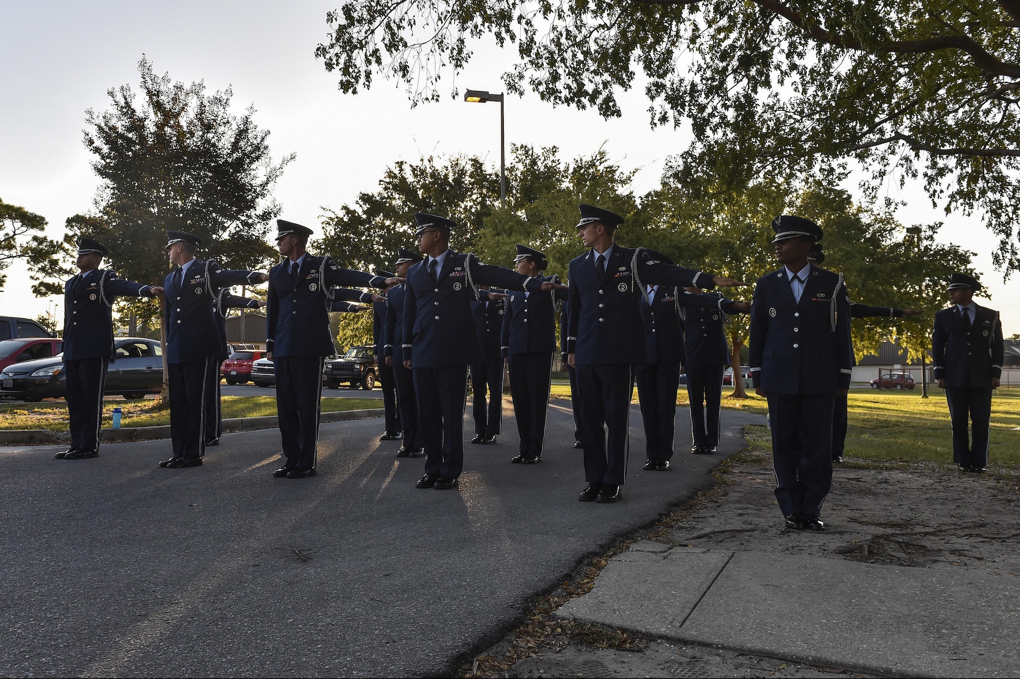 Base honor guard members gather in a formation for a uniform inspection during training at Hurlburt Field, Fla., Oct. 19, 2015. Hurlburt Field, Eglin Air Force Base and Tyndall AFB, Fla., base honor guard members received standardization training from Airmen with the U.S. Air Force Honor Guard mobile training team, Bolling AFB, Washington, D.C. (U.S. Air Force photo by Senior Airman Jeff Parkinson)
