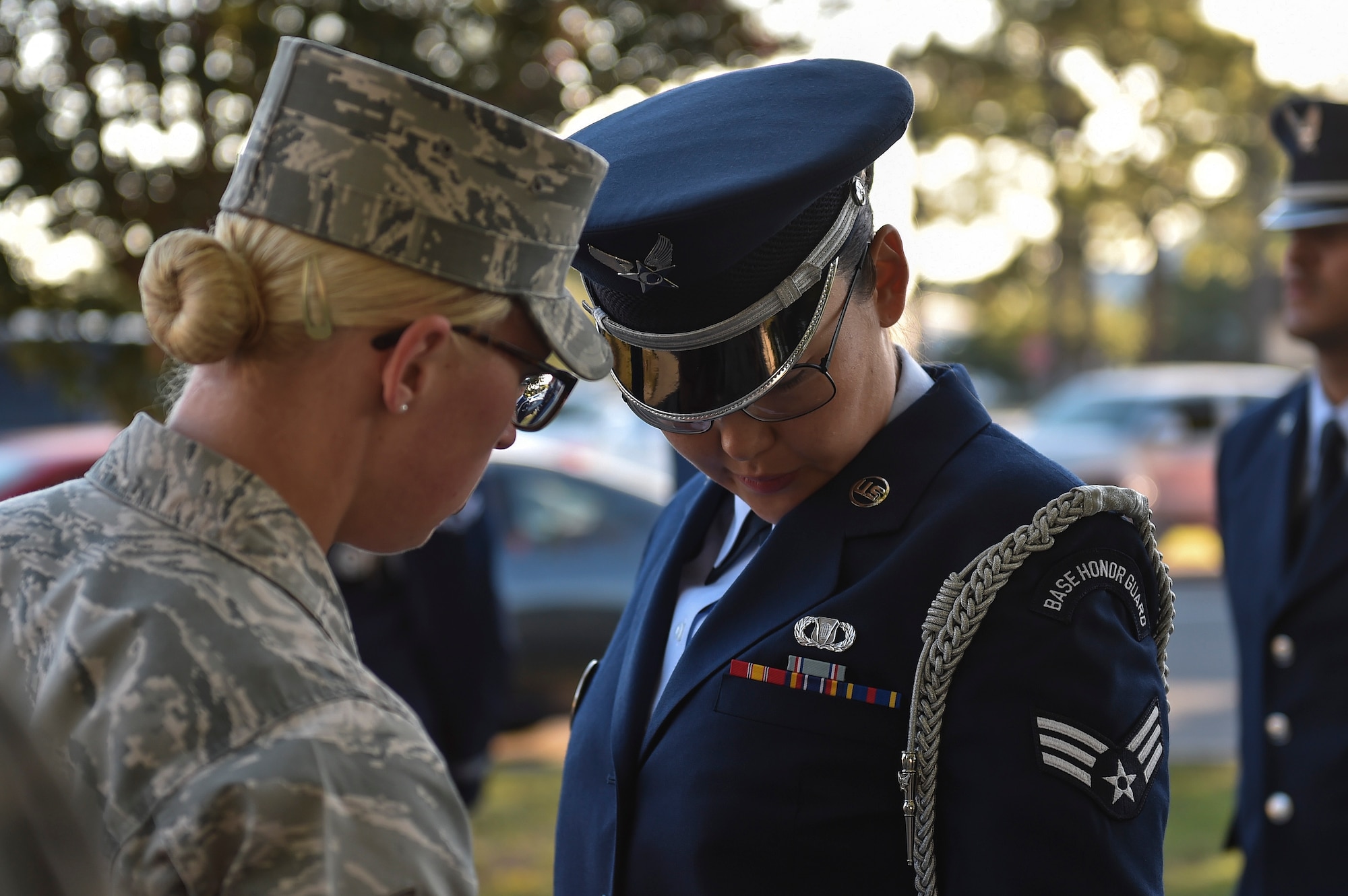 Staff Sgt. April Spilde, U.S. Air Force Honor Guard mobile training team instructor, tells Senior Airman Elizabeth Lanque, Tyndall Air Force Honor Guard member’s about infractions during a uniform inspection at Hurlburt Field, Fla., Oct. 19, 2015. A team of three U. S. Air Force Honor Guard mobile training team instructors spent seven days training base honor guard members on standardized flag presentation, firing party and pallbearer techniques. (U.S. Air Force photo by Senior Airman Jeff Parkinson)
