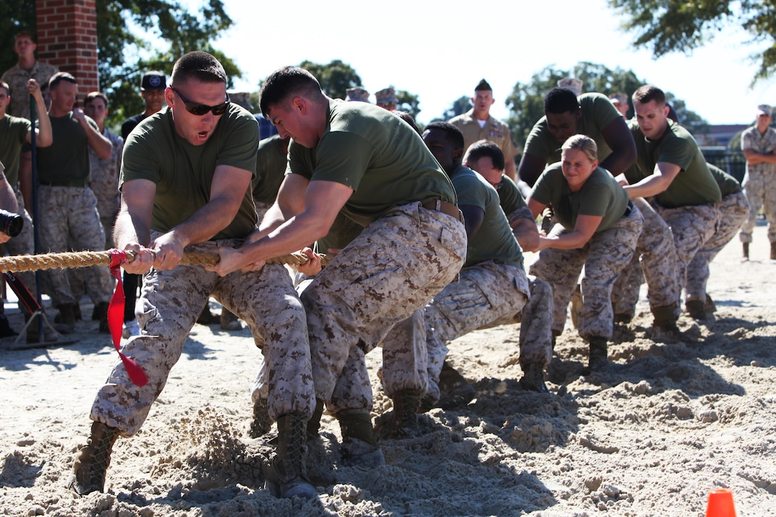 Marines with Headquarters and Headquarters Squadron pull as a team during the final round of the 2015 Combined Federal Campaign Tug-of-War Tournament at Marine Corps Air Station Cherry Point, N.C., Oct. 23, 2015. Eight teams composed of Marines and Sailors battled it out to take home the gold. The CFC gives federal employees an opportunity to make donations to over 20,000 non-profit organizations and charities. The drive is scheduled to end on Dec. 15, 2015. (U.S. Marine Corps photo by Pfc. Nicholas P. Baird/ Released)