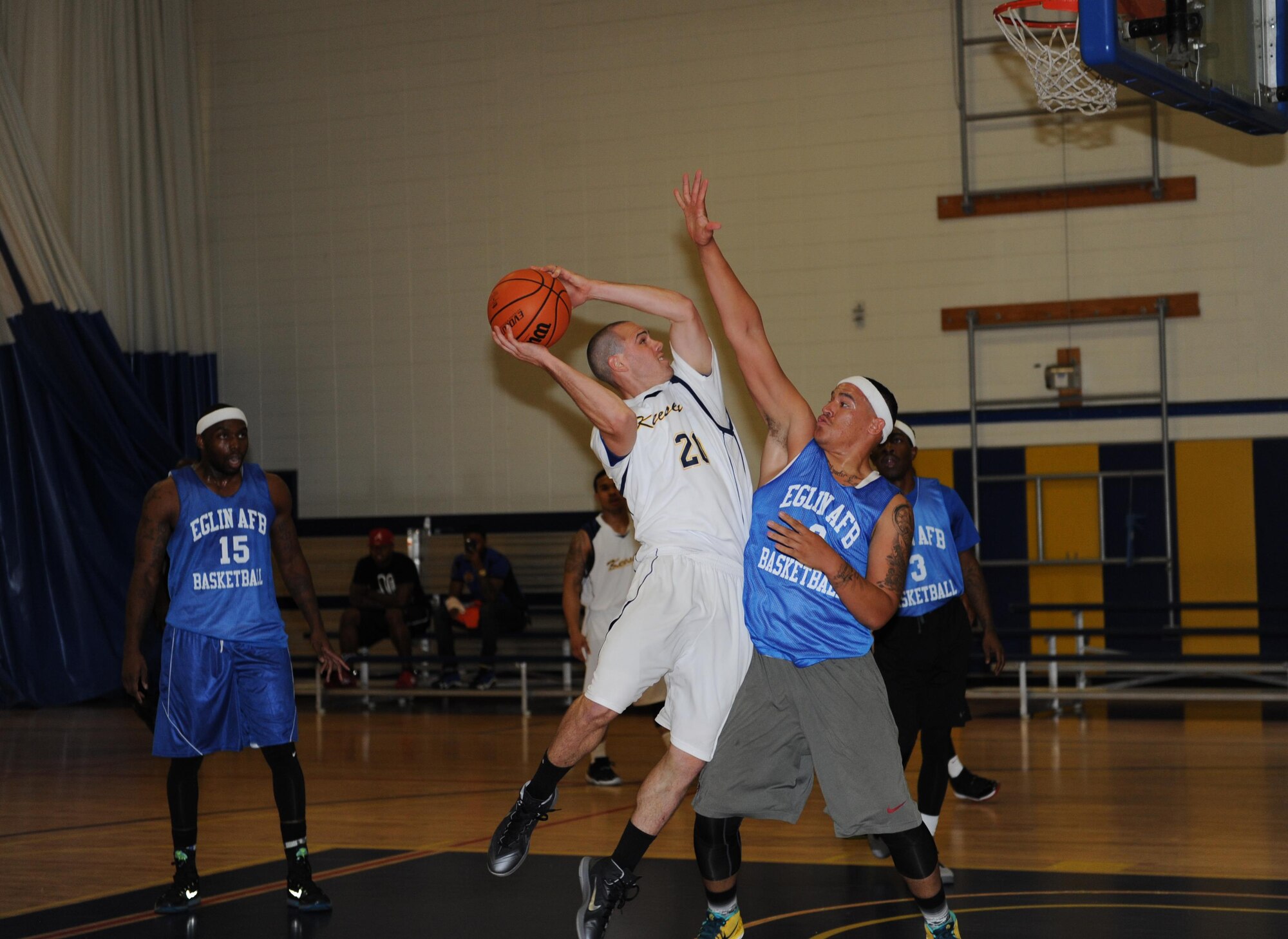 Dominic San Felippe, Dragon Fitness Center recreational aid, shoots the ball during a men’s varsity basketball game, Oct. 24, 2015, Keesler Air Force Base, Miss. Keesler defeated Eglin, 90-87. (U.S. Air Force photo by Kemberly Groue)