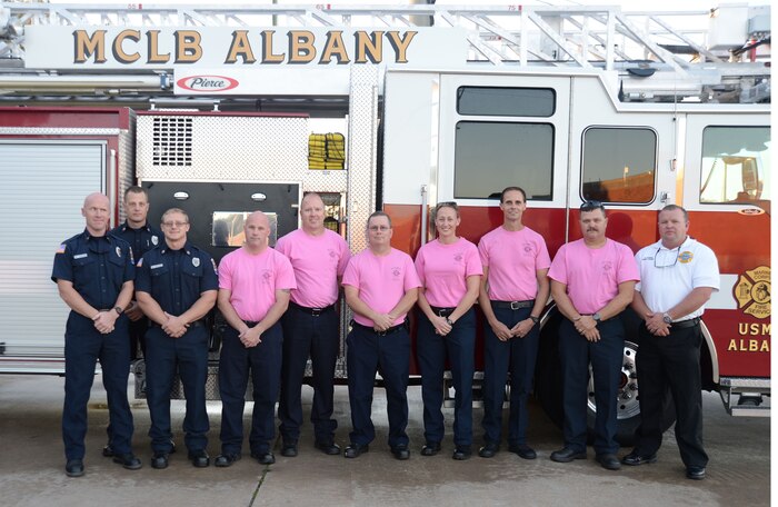 In support of the fight against breast cancer, several emergency medical technicians/firefighters and paramedics at Marine Corps Logistics Base Albany trade their usual uniforms-of-the-day for pink T-shirts during the month of October. Fire Department personnel have made it an annual tradition to participate in the nation’s “Think Pink” campaign in efforts of finding a cure for the disease.