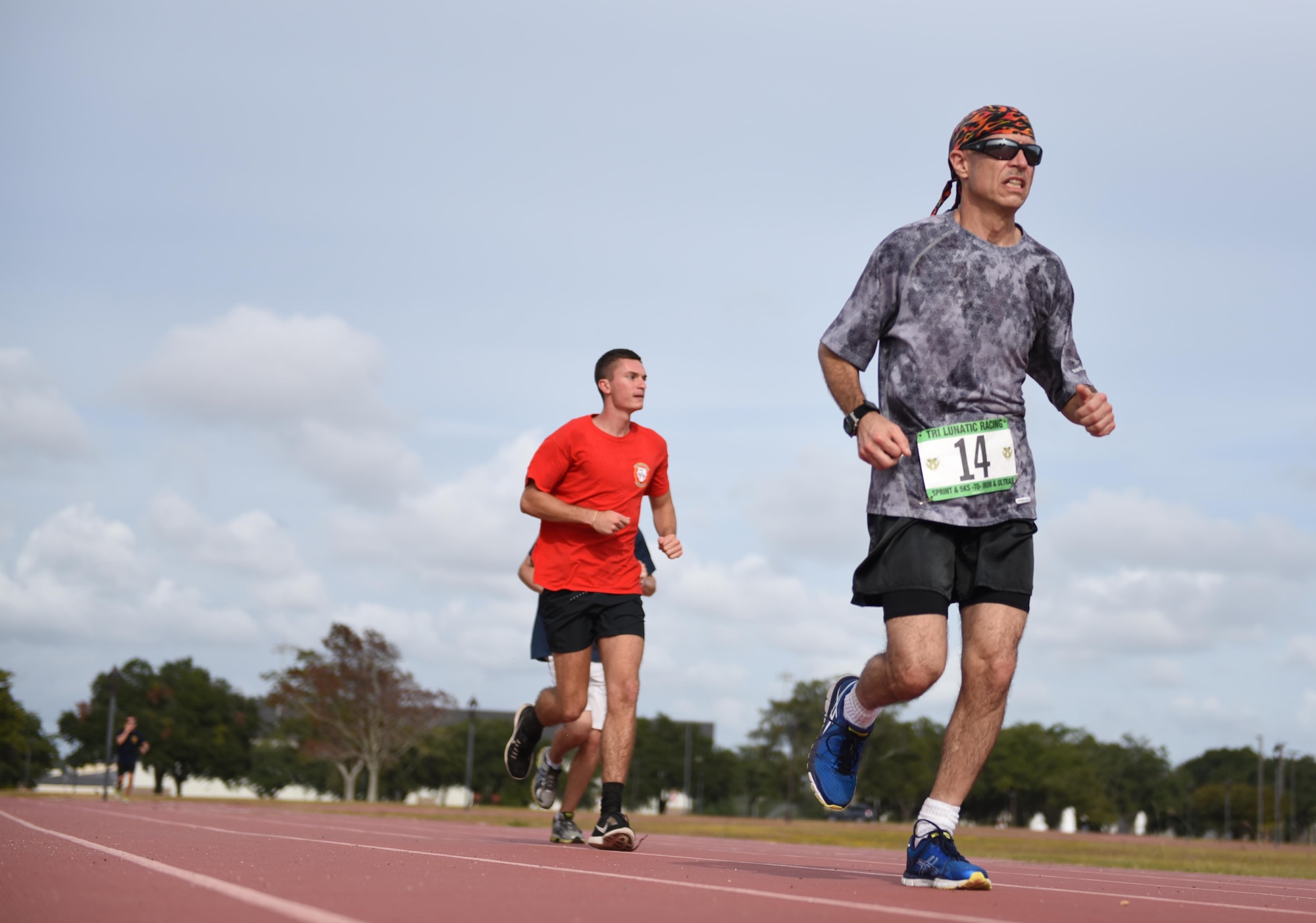 Lt. Col. George Harre, 81st Medical Support Squadron veterinarian, paces himself on the triangle track during the 6th annual Dragon Challenge, Oct. 24, 2015, Keesler Air Force Base, Miss. The Dragon Challenge was Keesler’s Combined Federal Campaign kickoff event. Base sponsors donated money per lap finished by team and solo runners during a 12-hour period. Harre finished first in the solo male category, running 56 miles. (U.S. Air Force photo by Tech. Sgt. Greg Biondo)