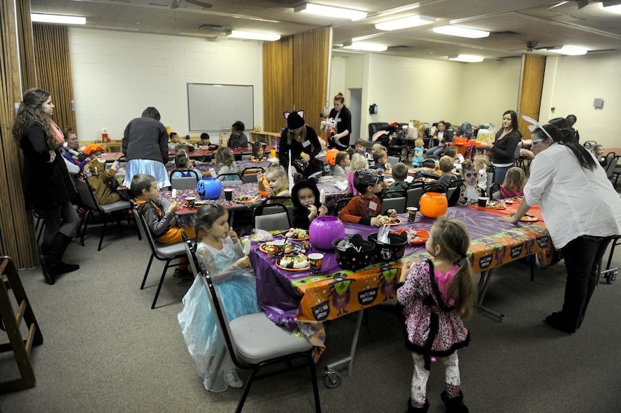 Children from the Preschool Co-op Home School Group at Minot Air Force Base, N.D., Oct. 26, 2015. The children were participating in a Halloween party during their weekly co-op meeting which brings children together from different families who are home schooled on Minot AFB. (U.S. Air Force photo by Staff Sgt. Chad Trujillo)