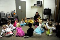 Cinthia Mauss teaches children Spanish during a pre-school home school co-op meeting at Minot Air Force Base, N.D., Oct. 26, 2015. The Children were participating in a Halloween party during their weekly co-op meeting which brings children together from different families who are home schooled on Minot AFB. (U.S. Air Force photo by Staff Sgt. Chad Trujillo)