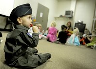 A small child dressed as a U.S. Air Force pilot from the Preschool Co-op Home School Group at Minot Air Force Base, N.D., Oct. 26, 2015. The children participated in a Halloween party during their weekly Co-op meeting which brings children together from different families who are home schooled on Minot AFB. (U.S. Air Force photo by Staff Sgt. Chad Trujillo)