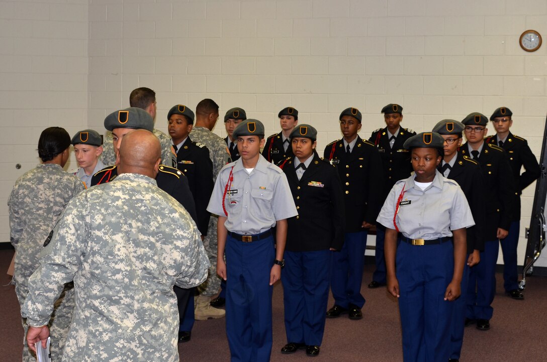 U.S. Army Soldiers from Joint Base Langley-Eustis inspect the uniforms of an Army Junior ROTC unit during the Hampton Roads Junior ROTC Drill Competition at Northampton Community Center in Hampton, Va., Oct. 24, 2015. U.S. Airmen and Soldiers from JBLE volunteered as judges for the competition that included eight different events, such as uniform inspections, color guard drills, armed and unarmed drills. (U.S. Air Force photo by Master Sgt. April Wickes/Released)