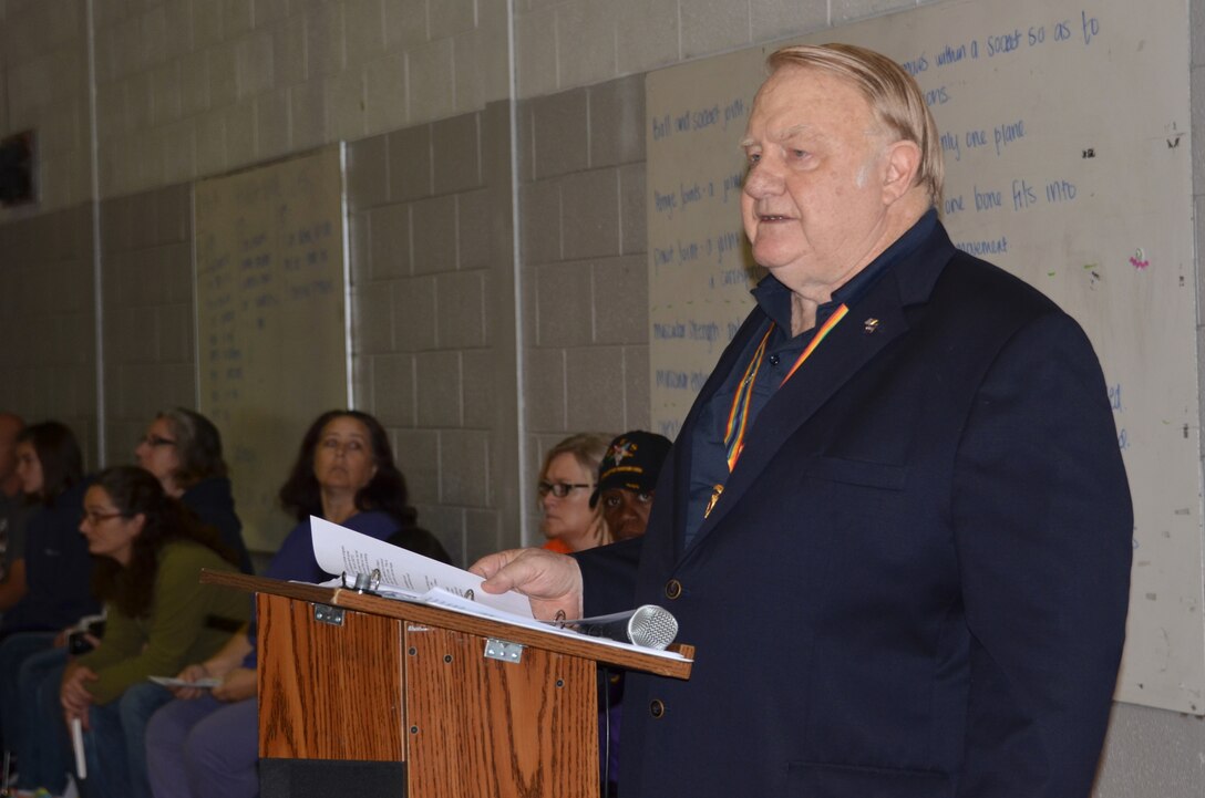 Retired U.S. Air Force Col. William Townsley speaks during the opening ceremony or the Hampton Roads Junior ROTC Drill Competition at Northampton Community Center in Hampton, Va., Oct. 24, 2015. The chapter hosted the competition to showcase the talent and dedication of local Junior ROTC cadets and provide family members an opportunity to watch the drill performances. (U.S. Air Force photo by Master Sgt. April Wickes/Released) 