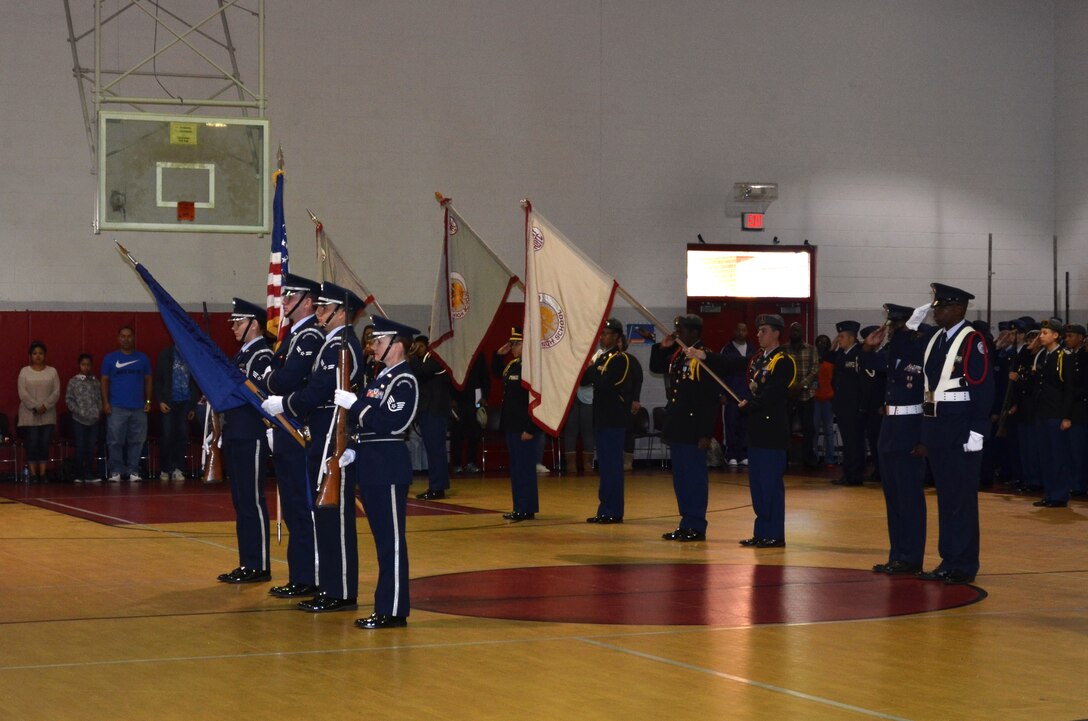 Members of the Langley Air Force Base Honor Guard present the colors during the opening ceremony of the Hampton Roads Junior ROTC Drill Competition at Northampton Community Center in Hampton, Va., Oct. 24, 2015. This is the first competition hosted by the Hampton Roads Chapter of the Military Order of the World Wars. (U.S. Air Force photo by Master Sgt. April Wickes/Released) 