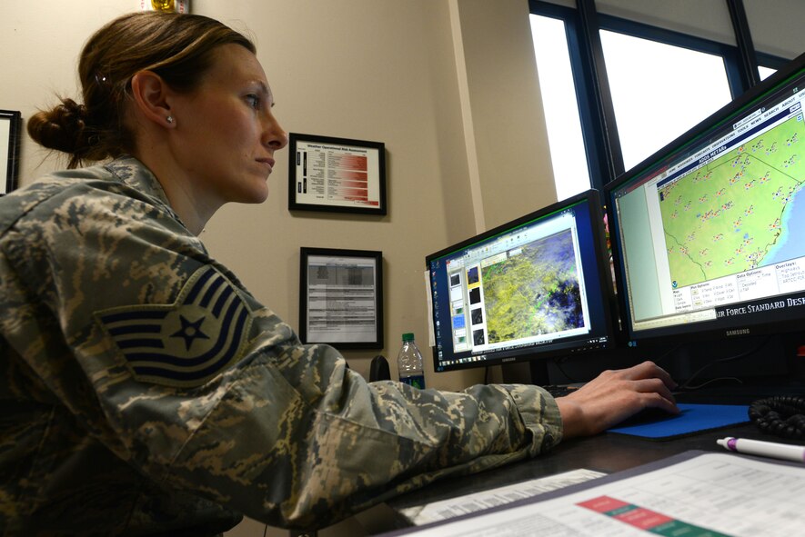 U.S. Air Force Tech. Sgt. Crystal Lucas, 20th Operations Support Squadron weather flight forecaster, looks at satellite images of clouds over South Carolina at Shaw Air Force Base, S.C., Oct. 27, 2015. Weather forecasters can work up to 16 hours a day, ensuring 20th Fighter Wing pilots have the information they need to stay safe in the air. (U.S. Air Force photo by Airman 1st Class Kelsey Tucker/Released)