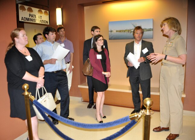 Capt. Elizabeth Maley (right), Naval Health Clinic Charleston commanding officer,  highlights various healthcare services available at NHCC during a tour for Leadership Charleston at Joint Base Charleston – Weapons Station, Oct. 15, 2015. Leadership Charleston is a 10-month long program offered by the Chamber of Commerce to provide local professionals enrichment opportunities to engage with citizens and organizations within our communities and to get an intensive, up-close look at various issues impacting the Lowcountry.  (U.S. Navy photo/Kris Patterson)