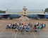 Motorcyclists pose for a group photo in front of two B-52 Stratofortresses on Barksdale Air Force Base, La., Oct. 23, 2015. More than 30 riders gathered for a safety brief and group photo celebrating the fourth annual Cajun Rumble hosted by the Green Knights Motorcycle Club Chapter 75. (U.S. Air Force photo/Airman 1st Class Mozer O. Da Cunha)