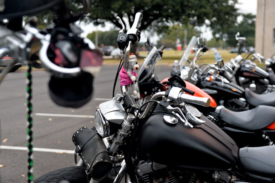 Motorcycles sit together for the fourth annual Cajun Rumble hosted by the Green Knights Motorcycle Club Chapter 75 at Barksdale Air Force Base, La., Oct. 23, 2015. The first chapter of the Green Knights was formed in 1999, and today there are more than 105 chapters worldwide. The event consisted of a safety briefing and a group photo. (U.S. Air Force photo/Airman 1st Class Mozer O. Da Cunha)