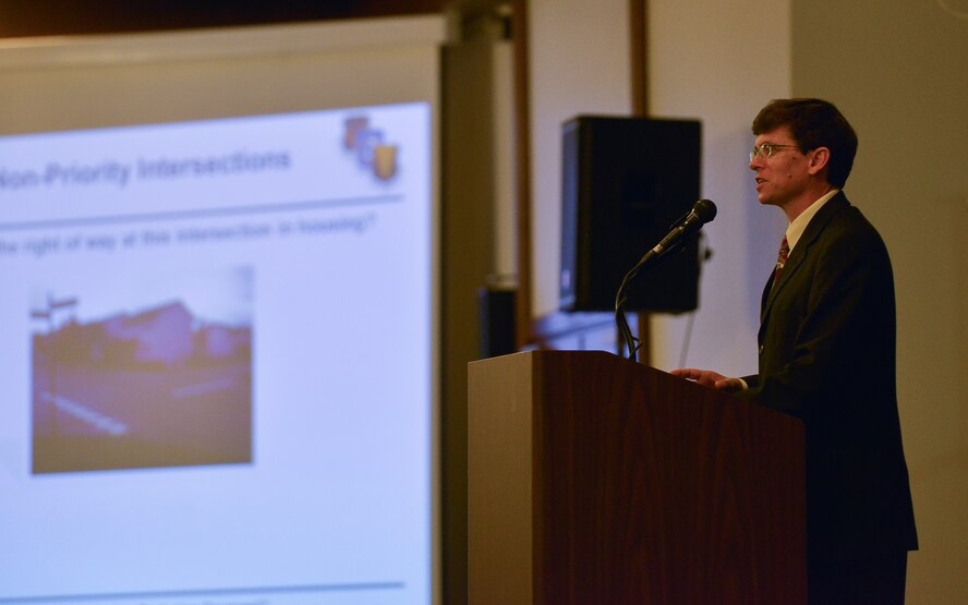 Robbie Bogard, 86th Airlift Wing occupational safety and health manager, talks about staying safe throughout the upcoming winter season during a commander’s call Oct. 20, 2015, at Ramstein Air Base, Germany. Safety was one of a few topics discussed during the event that included the 86th AW’s new vision. (U.S. Air Force photo/Airman 1st Class Lane T. Plummer)