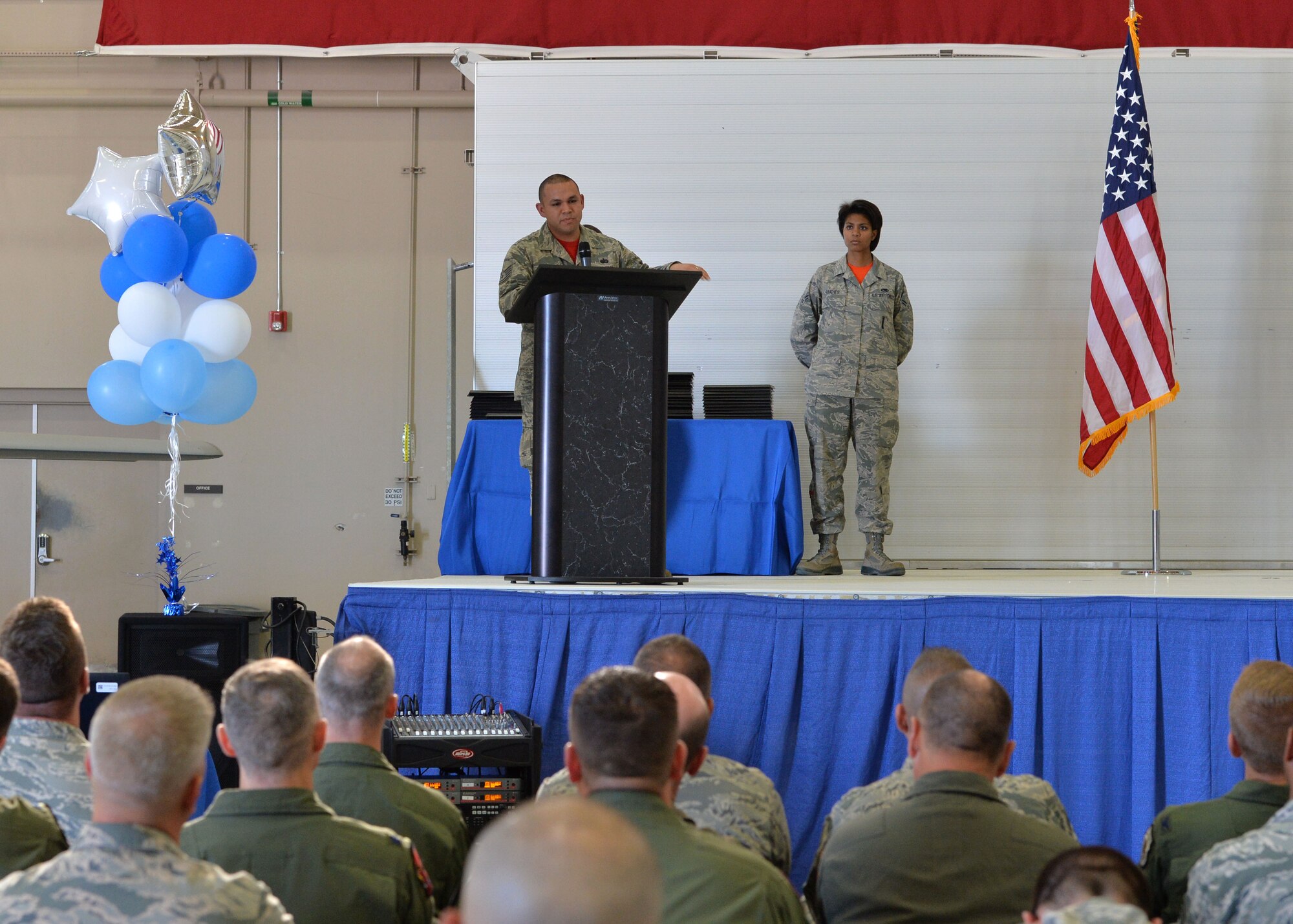 Tech. Sgt. Daniel Villegas, 432nd Wing/432nd Air Expeditionary Wing NCO in-charge of protocol, speaks to staff sergeant selects as the guest speaker during the Creech Air Force Base, Nev., NCO Induction Ceremony Oct. 23, 2015. Approximately 50 inductees were honored for their promotion and received important leadership advice as they prepare to transition to the NCO ranks. This was the first time Team Creech Airmen were recognized with a formal NCO induction ceremony. (U.S. Air Force photo by Senior Airman Adarius Petty)