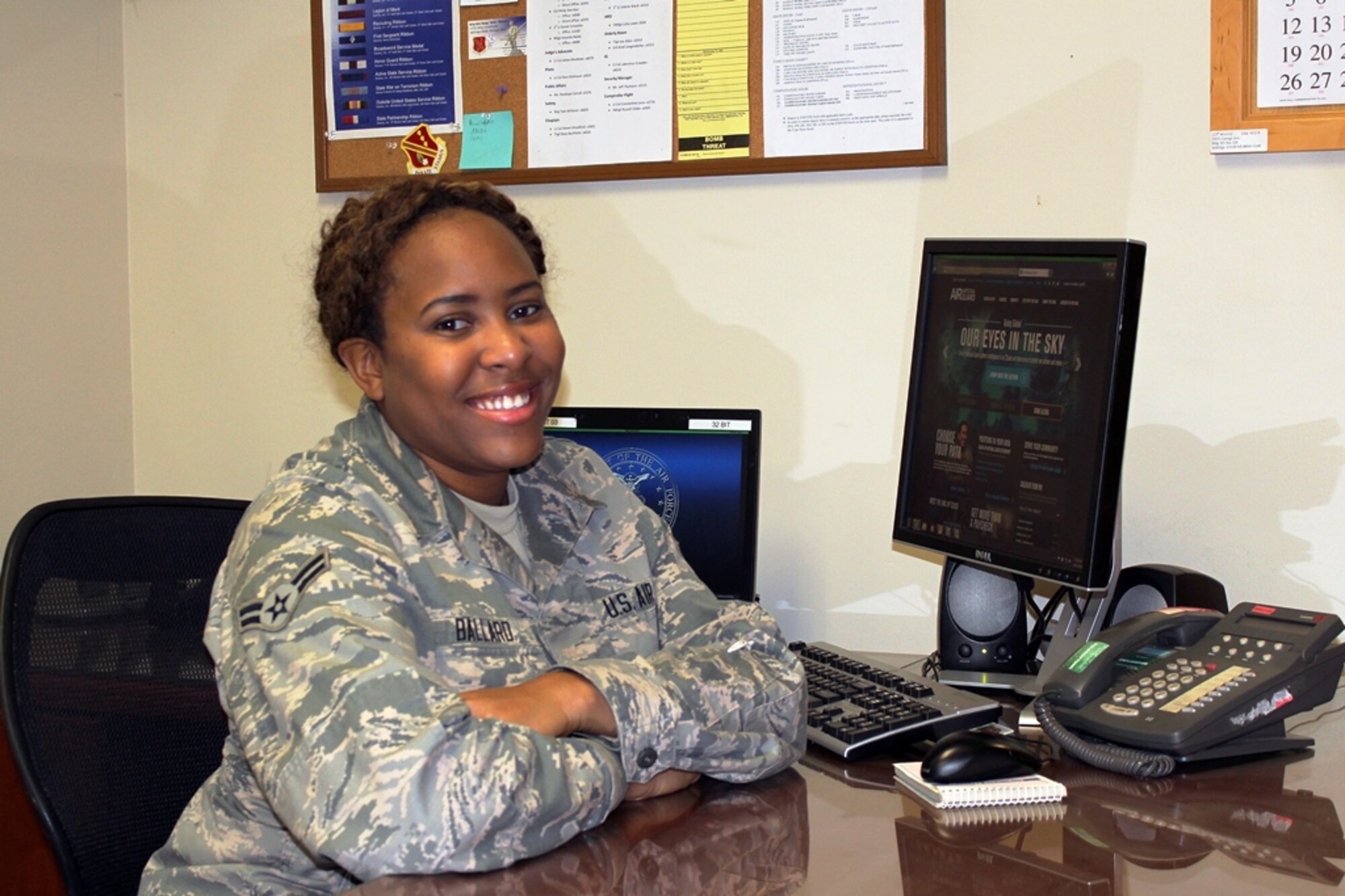 151027-Z-VA676-072 -- Airman 1st Class Kyra Ballard sits in the orderly room of the 127th Wing headquarters at Selfridge Air National Guard Base, Oct. 27, 2015. Ballard said she enlisted in the Air National Guard to create an opportunity for herself. “Joining the Air Force is probably the best decision I have made in my life, so far,” she said. (U.S. Air National Guard photo by Tech. Sgt. Dan Heaton)