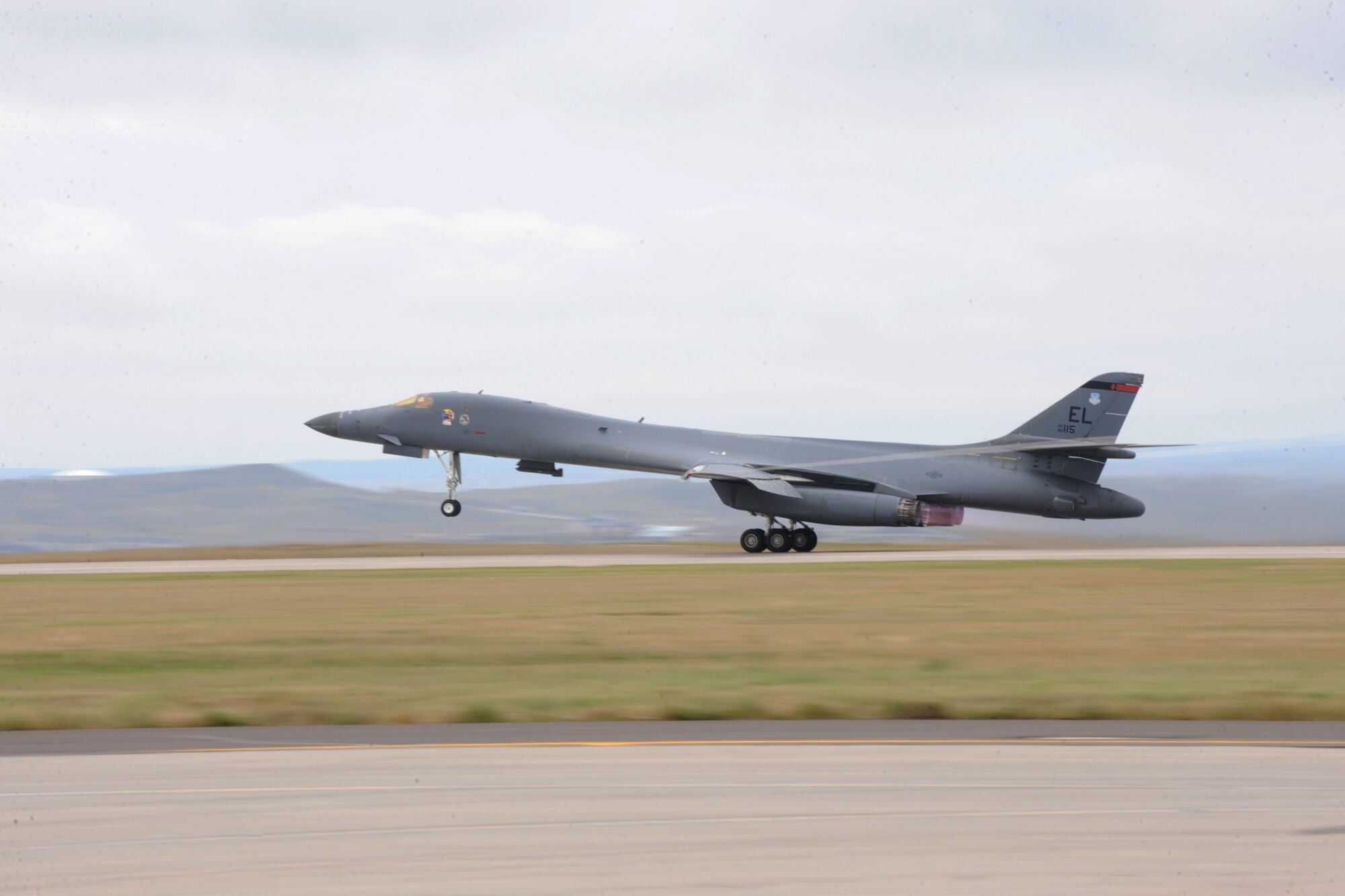 A B-1 bomber takes off as part of surge week at Ellsworth Air Force Base, S.D., Oct. 5, 2015. Airmen from the 28th Aircraft Maintenance Squadron provide safe and reliable aircraft for B-1 bomber pilots and weapons system officers, and perform surges annually to ensure Ellsworth???s aircraft remain mission-capable at all times. (U.S. Air Force photo by Airman 1st Class Denise M. Nevins/Released)