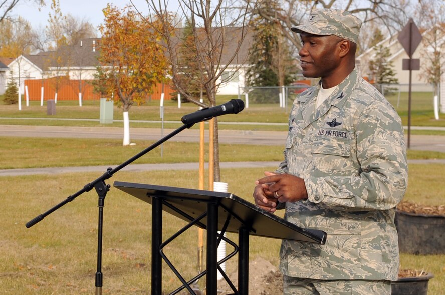 Col. Rodney Lewis, 319th Air Base Wing commander, offers opening remarks at an Arbor Day ceremony Oct. 26, 2015, on Grand Forks Air Force Base, N.D. The ceremony included the planting of three new trees in cooperation with the North Dakota Forestry Service. (U.S. Air Force photo/Staff Sgt. Susan L. Davis)
