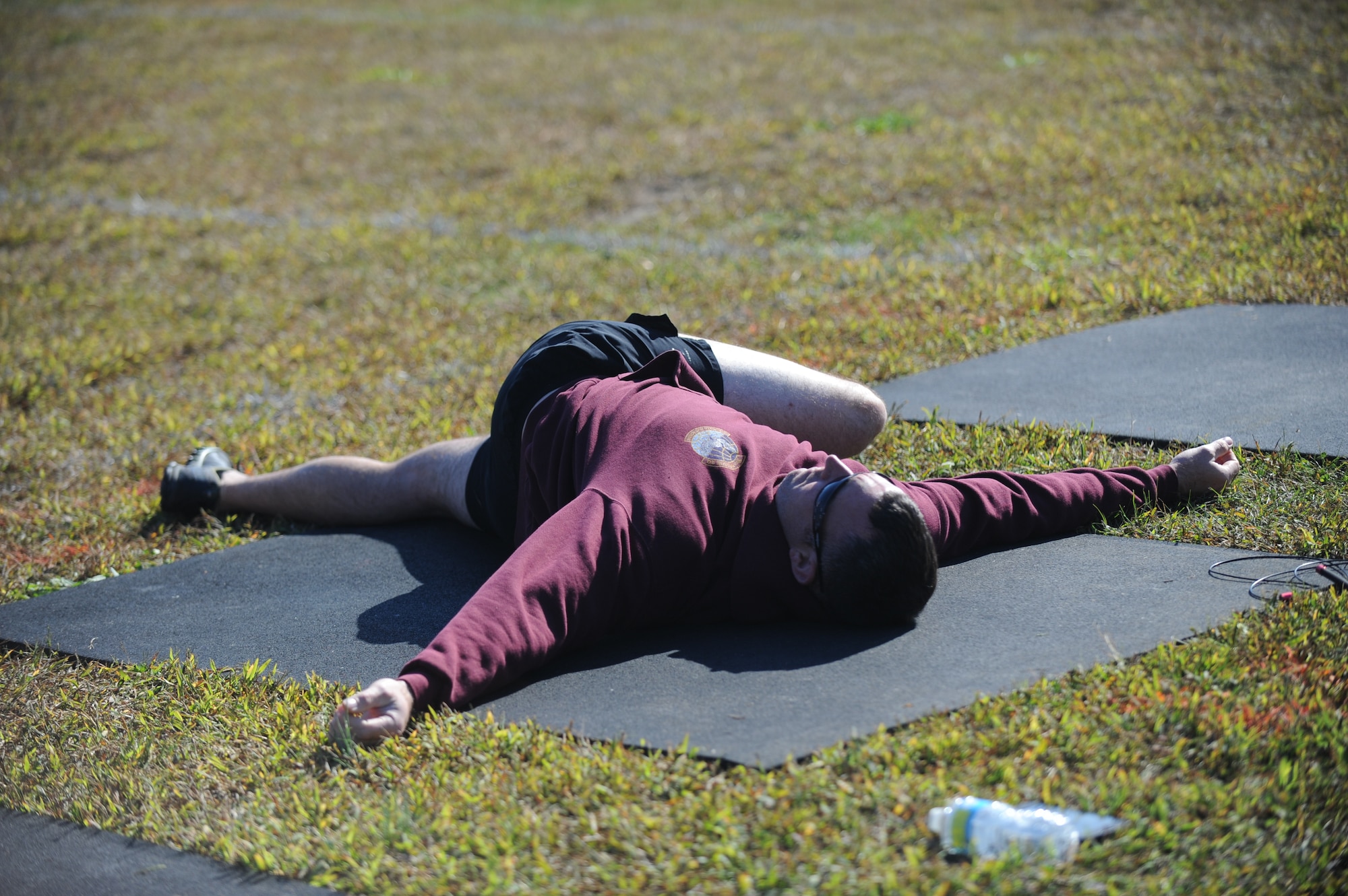 Tech. Sgt. Clayton Morris, 436th Operations Support Squadron Air Crew Flight Equipment NCO in charge of technician training, stretches prior to the start of the Eastern Shore Affiliate Challenge Oct. 17, 2015, in Georgetown, Del. This was Morris’ first CrossFit competition and he competed in the men’s scaled division. (U.S. Air Force photo/Staff Sgt. Elizabeth Morris)