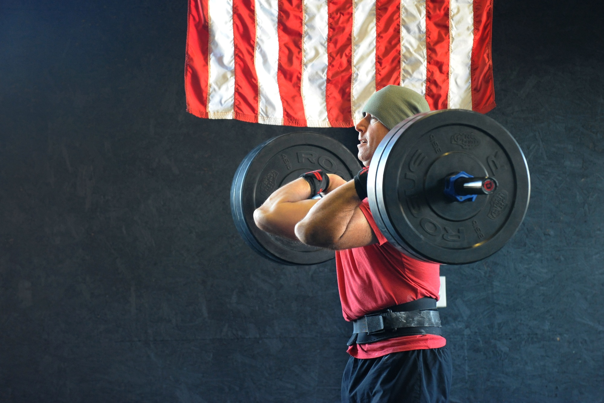 Tech. Sgt. Clayton Morris, 436th Operations Support Squadron Air Crew Flight Equipment NCO in charge of technician training, performs a clean and jerk during the first event of the Eastern Shore Affiliate Challenge Oct. 17, 2015, in Georgetown, Del. Morris won second place in the scaled men’s division of the competition. (U.S. Air Force photo/Staff Sgt. Elizabeth Morris)