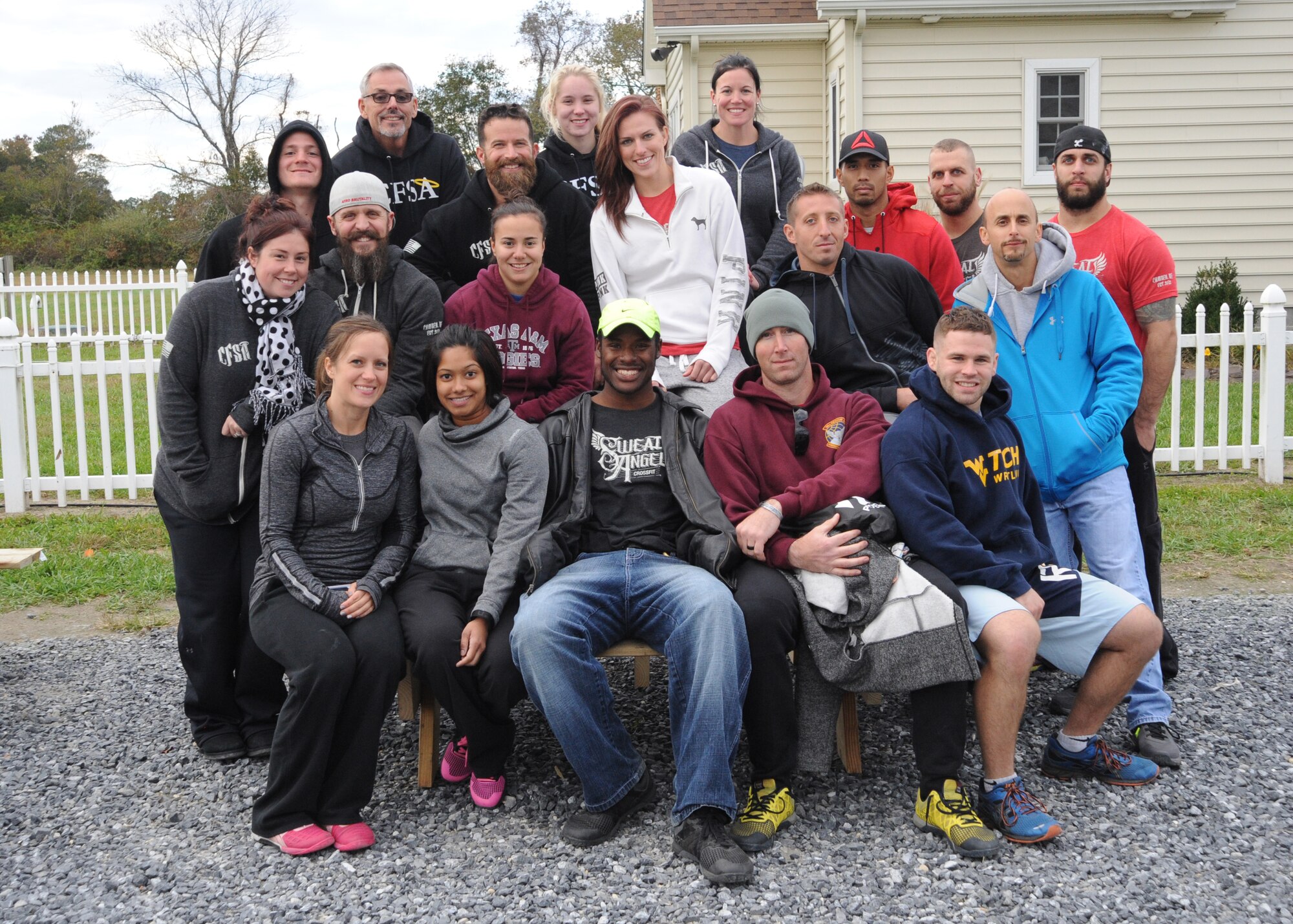 Members of Crossfit Sweat Angel pose for a group photo after the Eastern Shore Affiliate Challenge Oct. 17, 2015, in Georgetown, Del. Multiple Airmen from Team Dover and several CrossFit gyms participated in EASC. (U.S. Air Force photo/Staff Sgt. Elizabeth Morris)