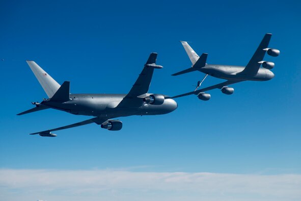 A KC-135 Stratotanker from Fairchild Air Force Base prepares to refuel a KC-46 Pegasus, with the KC-46 program's first test aircraft, a Boeing 767-2C (EMD-1). While the KC-46's role is to refuel other aircraft, it may need to refuel from other tankers to extend its range. Fuel Onload Fatigue testing is the first look at the KC-46 acting in that role. (U.S. Air Force photo/Christopher Okula)
