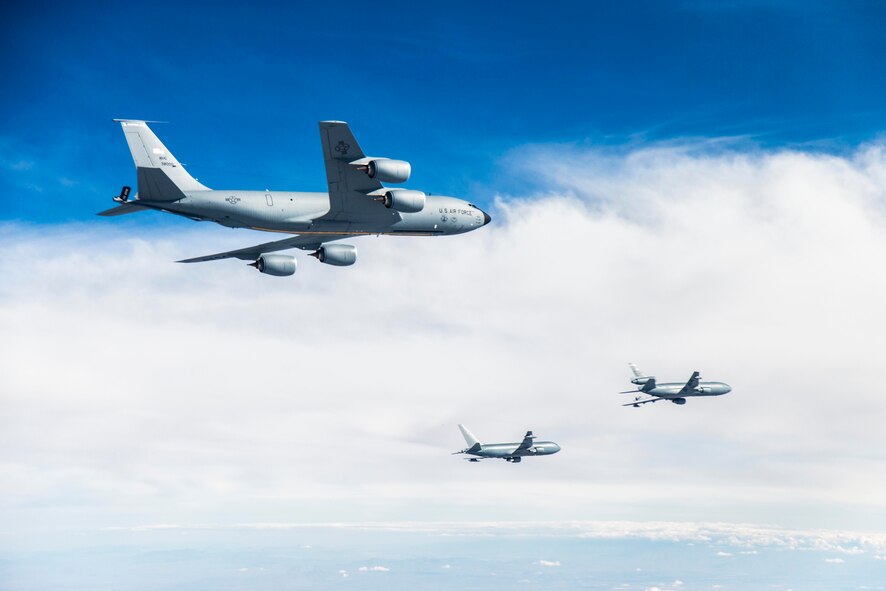 A KC-135 Stratotanker from Fairchild Air Force Base flies in formation with the KC-46 program's first test aircraft, a Boeing 767-2C (EMD-1), Oct. 15. Two KC-135 crew chiefs from the 92nd Air Refueling Wing are providing maintenance support for the Fairchild aircraft in support of Fuel Onload Fatigue testing operations. (U.S. Air Force photo/Christopher Okula)