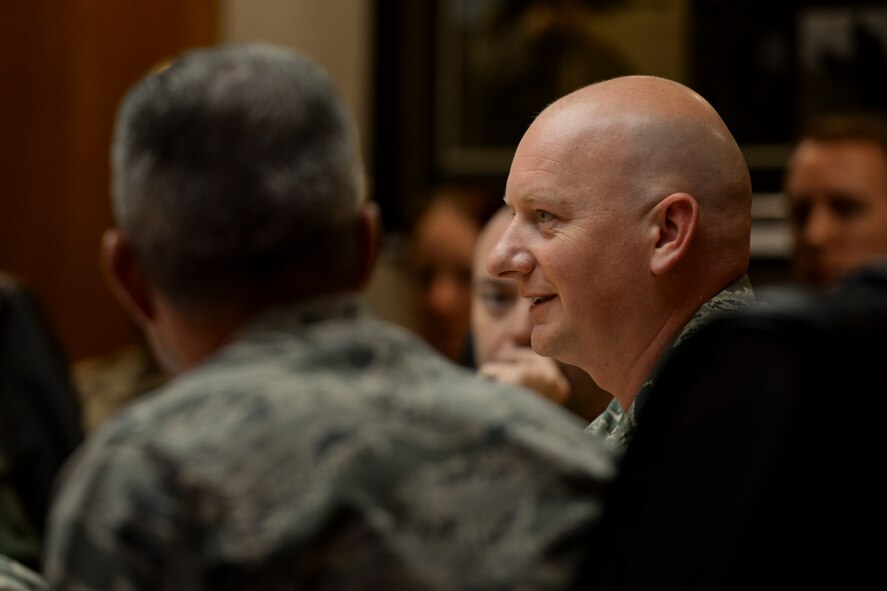 Chief Master Sgt. Michael Russell, Air Force Inspector General senior enlisted leader, speaks with 5th Bomb Wing and 91st Missile Wing I.G. members at Minot Air Force Base, N.D., Oct. 26, 2015.  The purpose of Lt. Gen. Greg Biscone, Inspector General of the Air Force, and Russell’s visit was to collect feedback on I.G. policies and procedures. (U.S. Air Force photo/Airman 1st Class J.T. Armstrong)