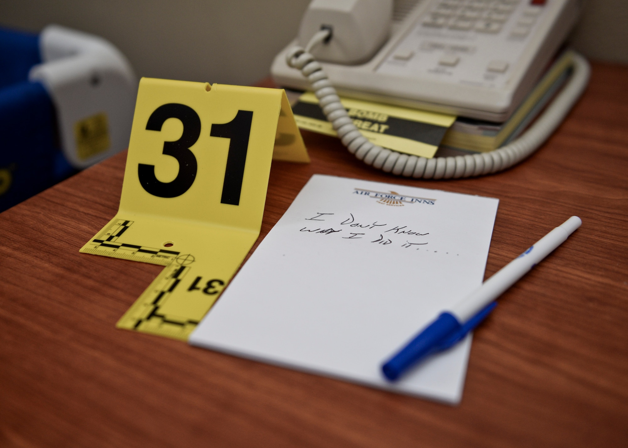 Evidence from a mock crime scene sits on a desk as part of training led by the Office of Special Investigations at Minot Air Force Base, N.D., Oct. 22, 2015. The two-part training day lasted about four hours and consisted of a slide presentation and a mock crime scene. (U.S. Air Force photo/Airman 1st Class J.T. Armstrong)