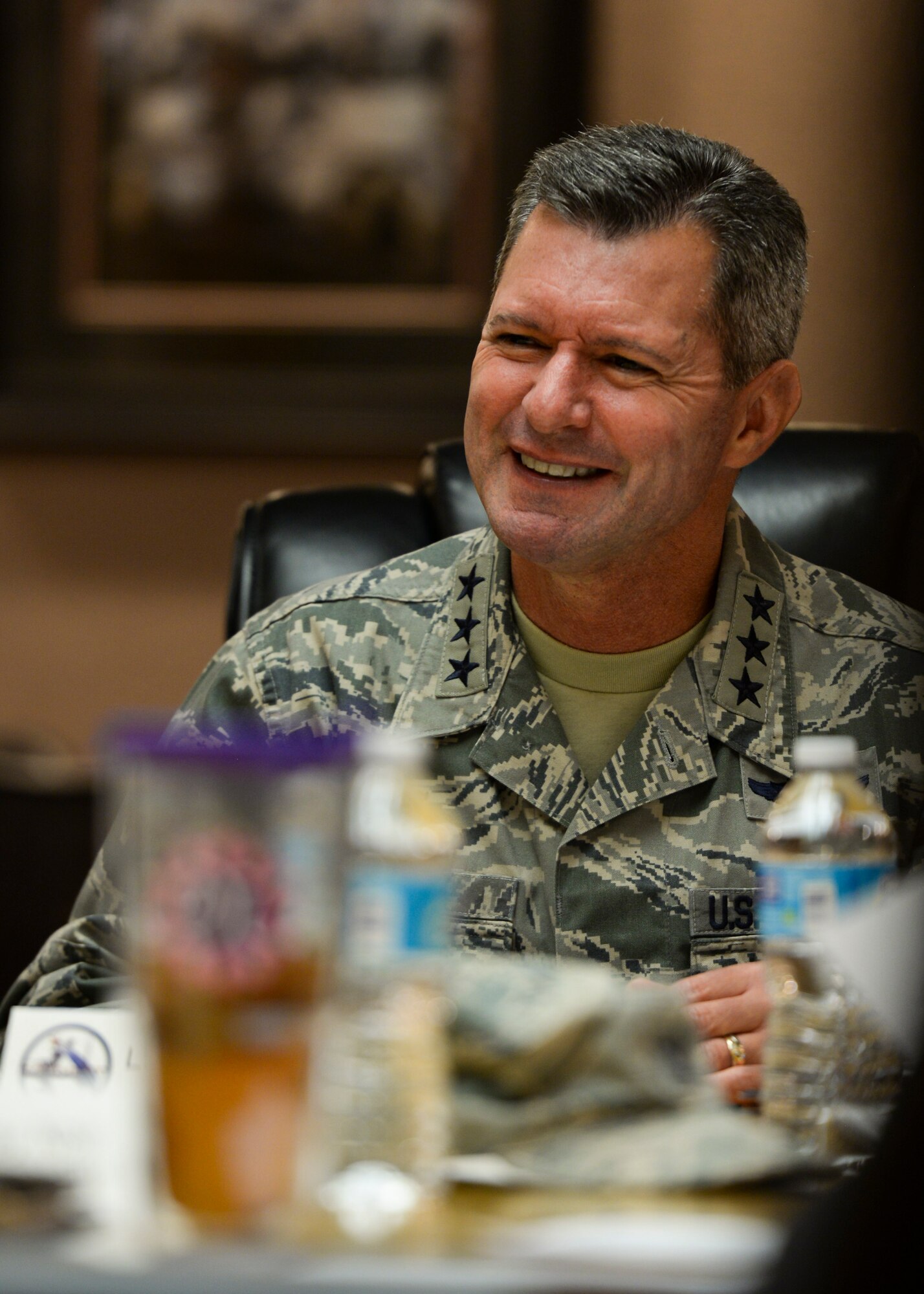Lt. Gen. Greg Biscone, Inspector General of the Air Force, laughs with 5th Bomb Wing and 91st Missile Wing leadership at Minot Air Force Base, N.D., Oct. 26, 2015.  The purpose of Biscone’s visit was to collect feedback on I.G. policies and procedures. (U.S. Air Force photo/Airman 1st Class J.T. Armstrong)
